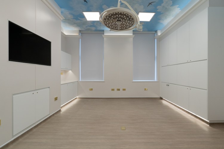 operating theatre with sky mural on ceiling
